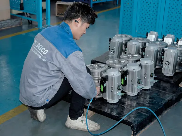 Pneumatic actuated ball valves being assembled and tested