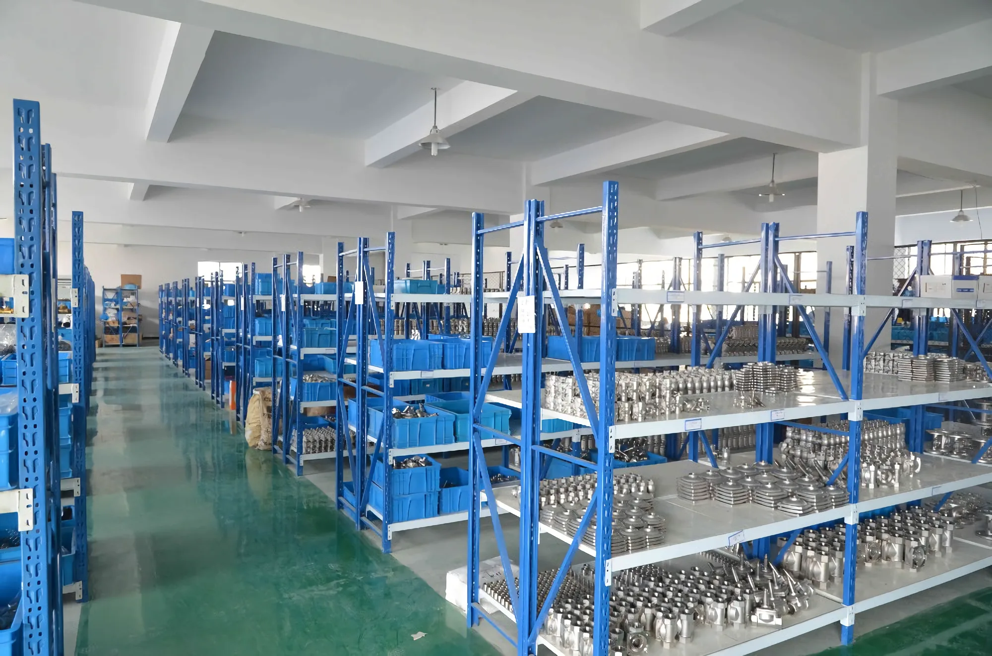 DELCO workshop with parts racks in Dongguan