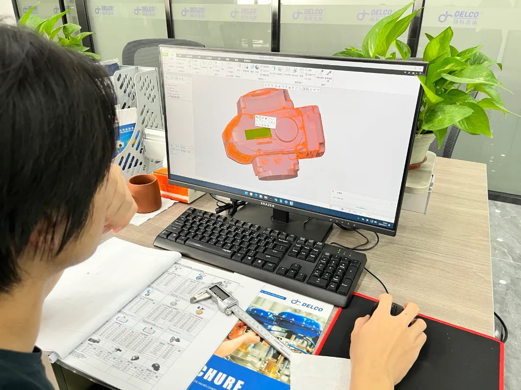 DELCO engineer designing a valve body in 3D CAD