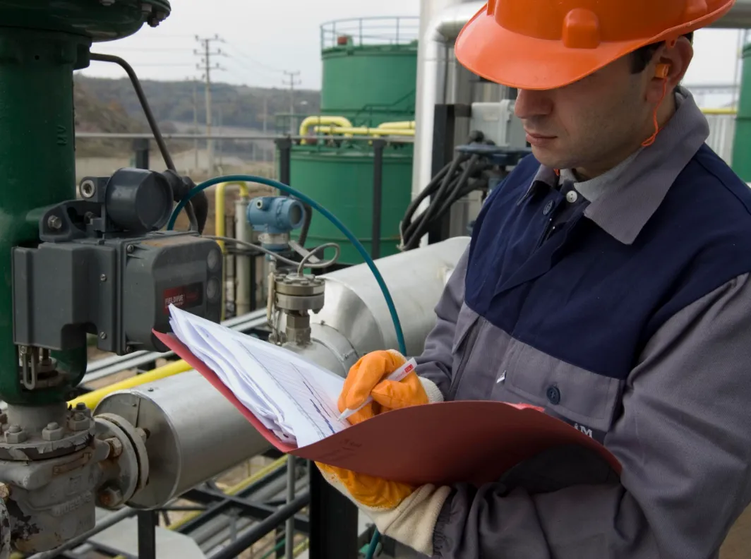 DELCO field engineer inspecting an installed valve